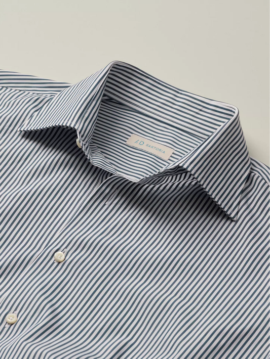 Close-up of a striped shirt with point collar