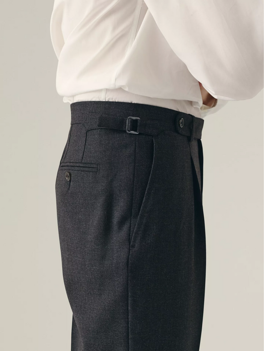 Dark grey pleated trousers with side adjuster