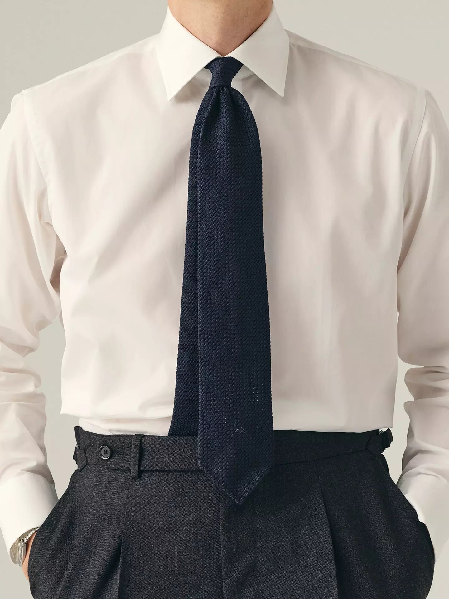White dress shirt with a navy tie