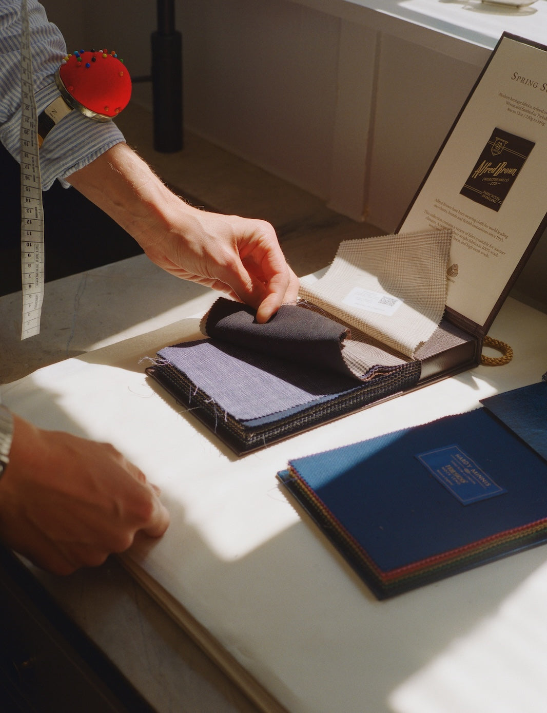 Person looking in fabric bunch book