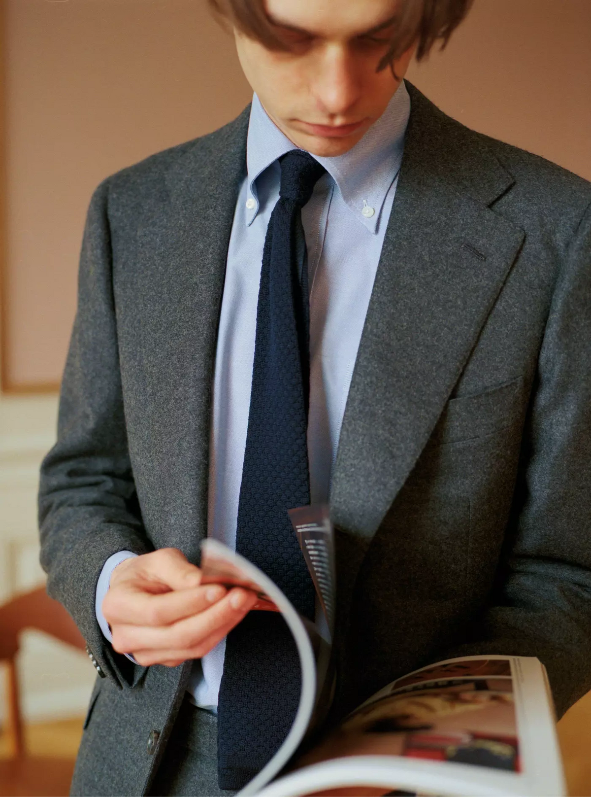 Man in A.D.Sartoria grey flannel suit and blue OCBD shirt