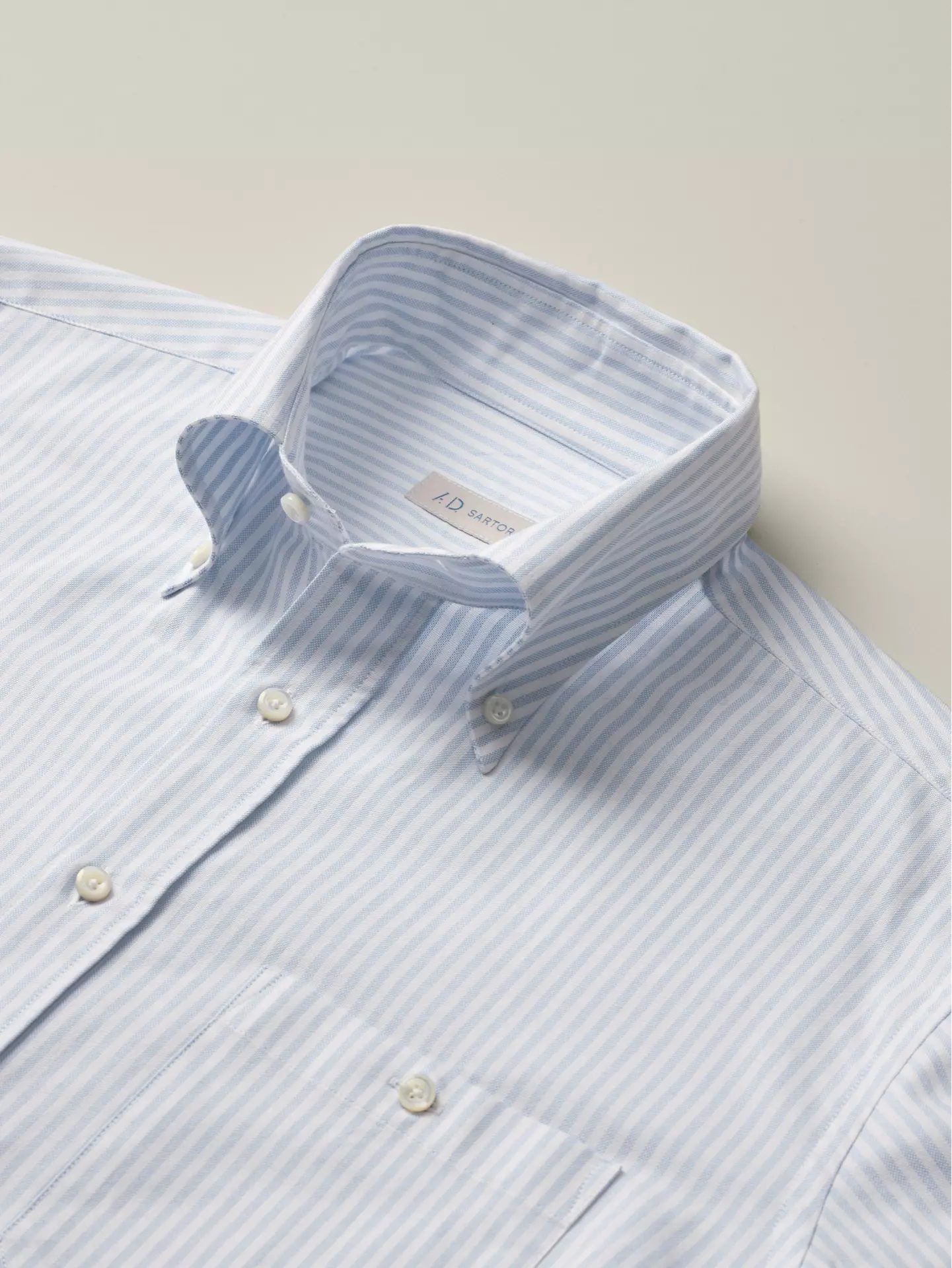 close up of a Blue & White striped shirt with button down in oxford fabric 