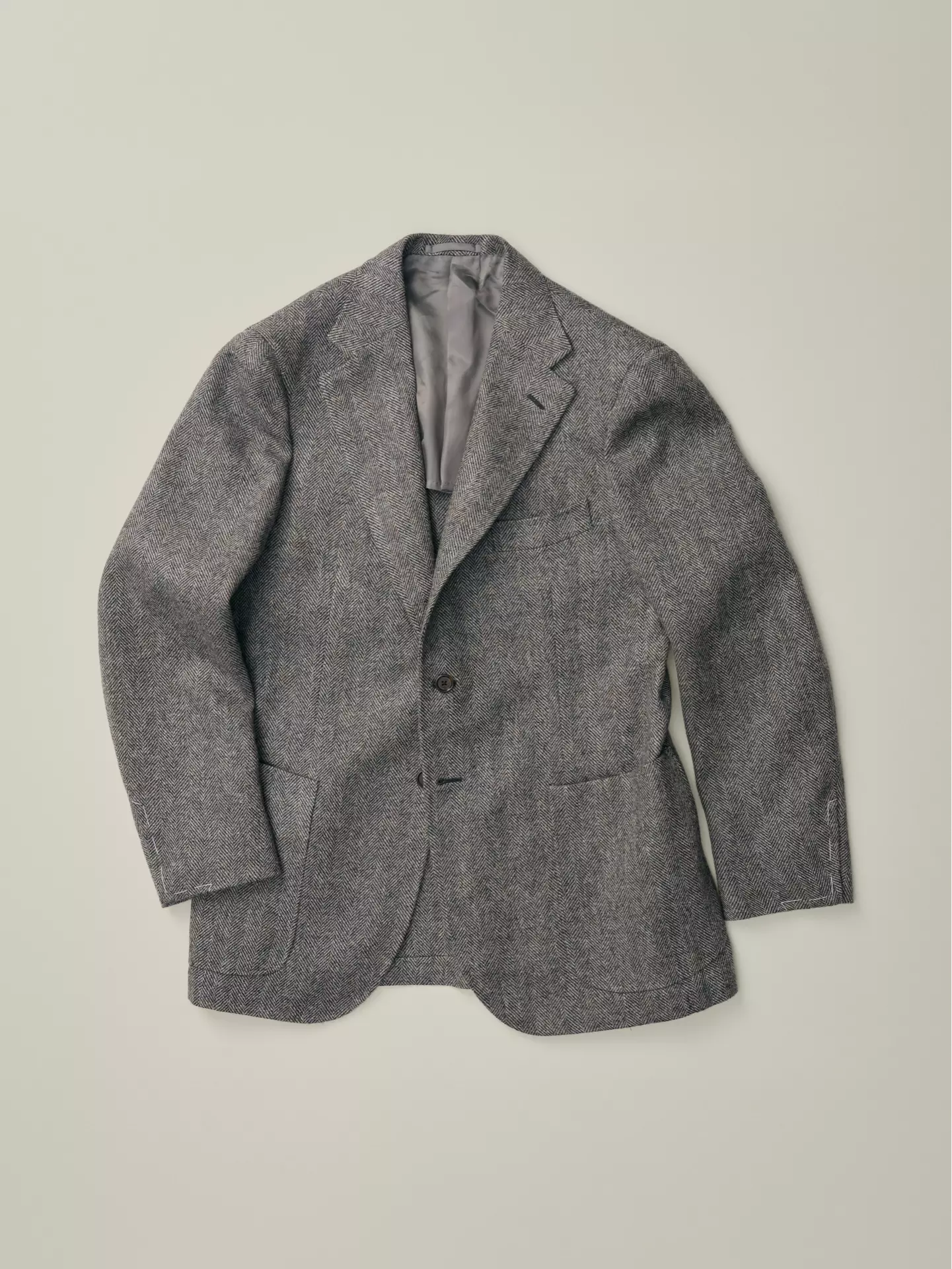 Mens jacket in black and white herringbone wool fabric